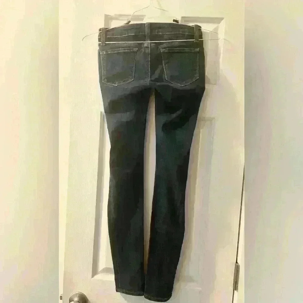 DSTLD women’s size 24 slim fit skinny jeans dark blue. EUC